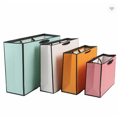 Bon prix 2022 Gros magasinage sacs en papier à large gaufre Pantone sacs cadeaux en papier de couleur en ligne